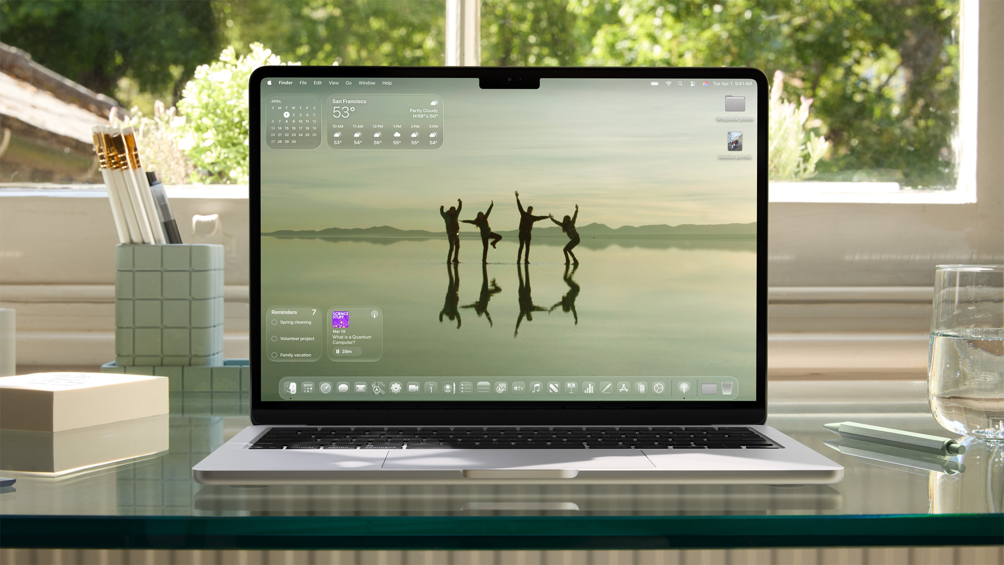 A MacBook on a desk running macOS 26.