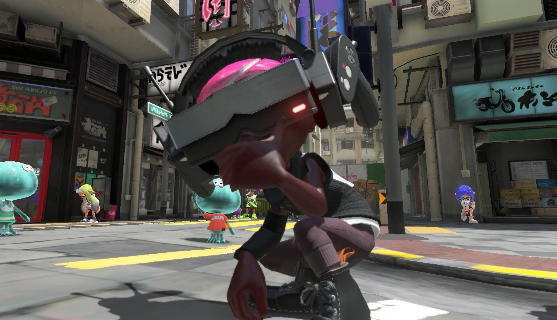 A Splatoon 3 screenshot depicting an Inkling squatting in a busy city square.