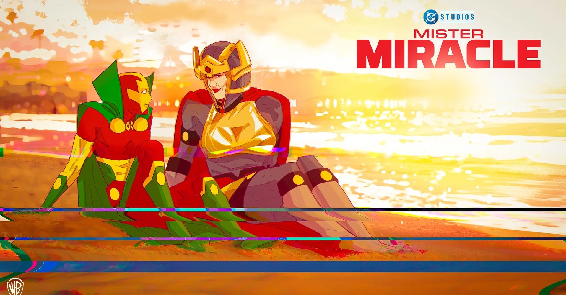 A caped man in a red and yellow costumes sitting on a sunlit beach next to a woman in a blue and gold costume.