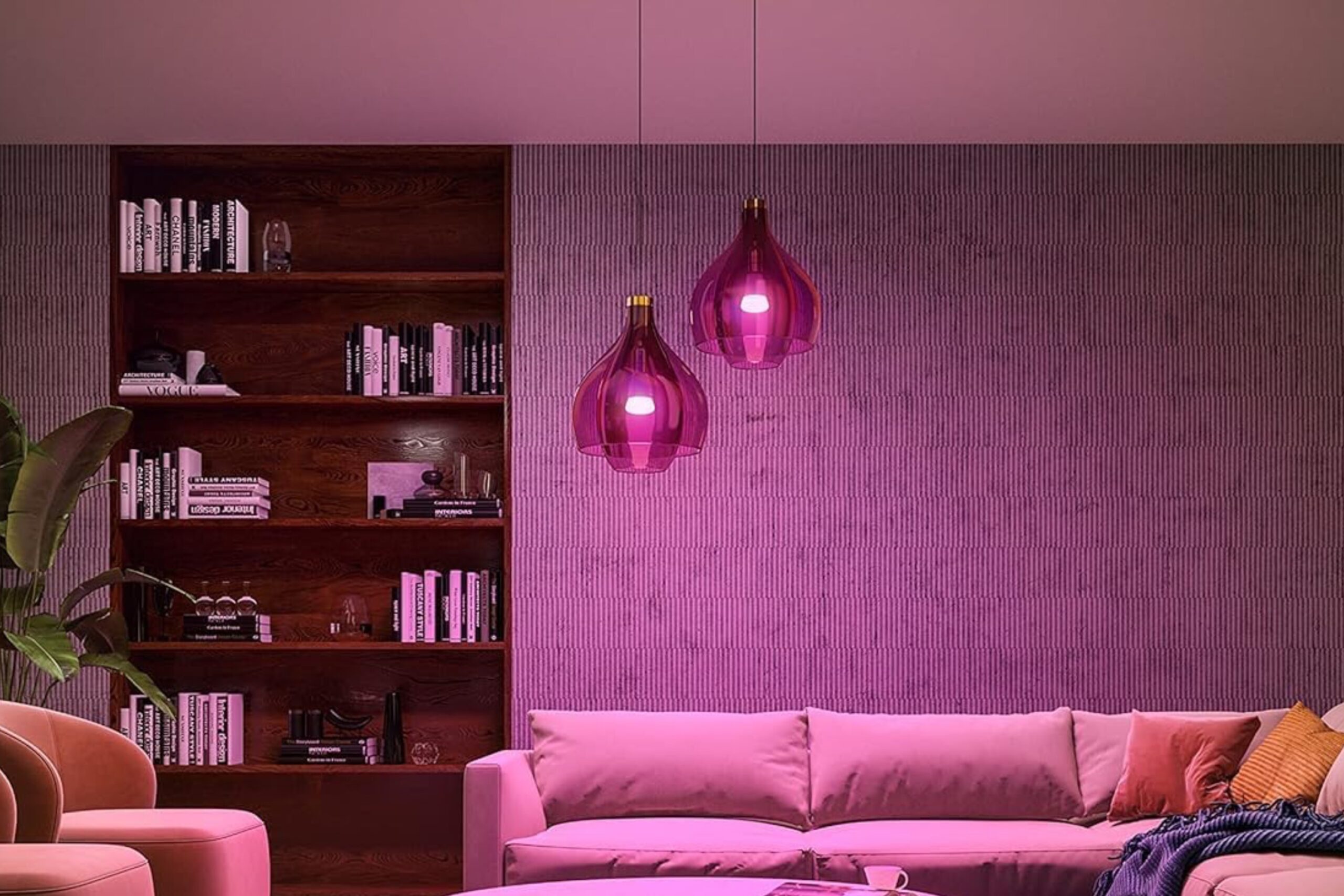 An image of Philips Hue bulbs in see-through lamps, coloring the room a hypnotic shade of magenta.