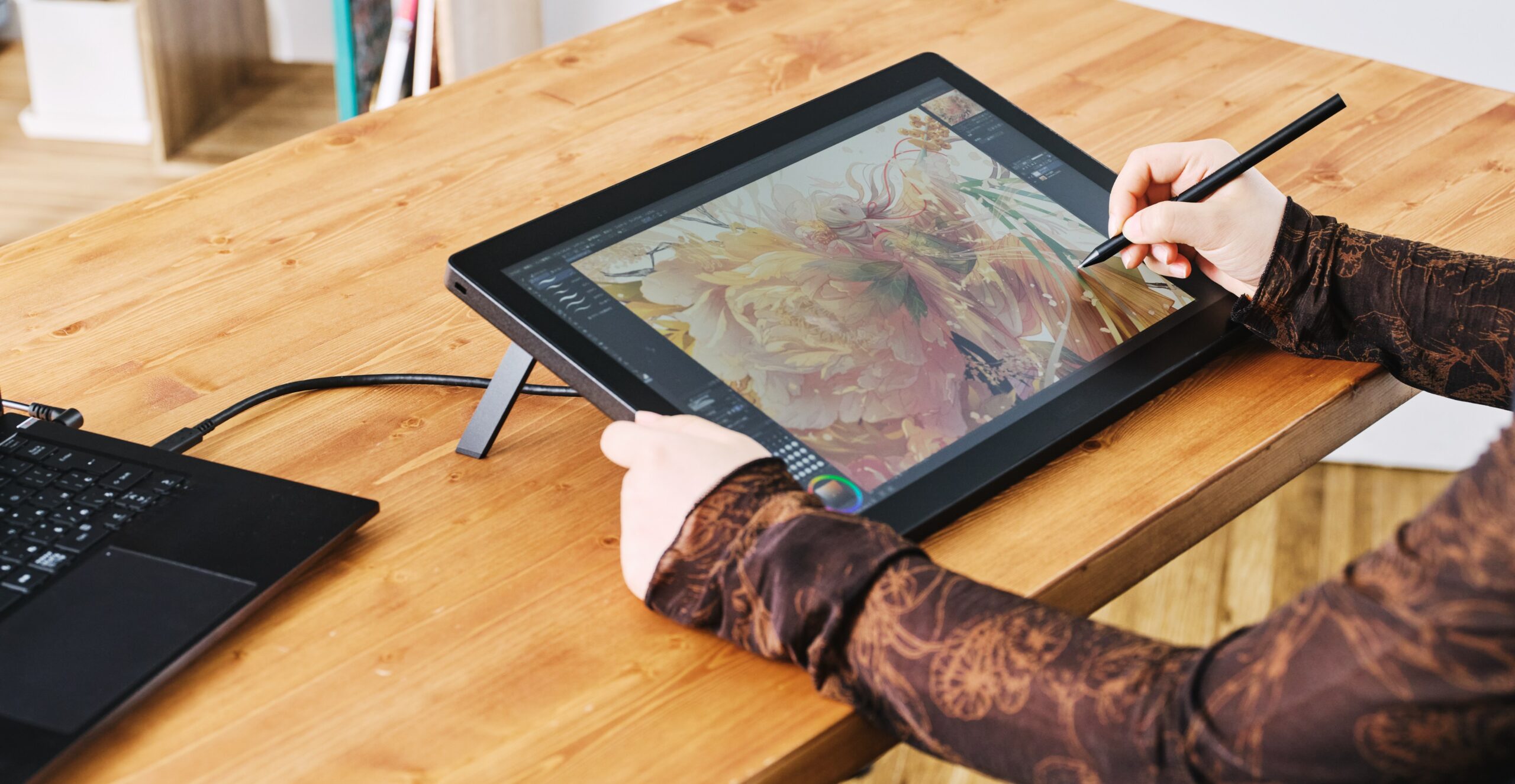 The Wacom Cintiq 16 being used to edit an image.