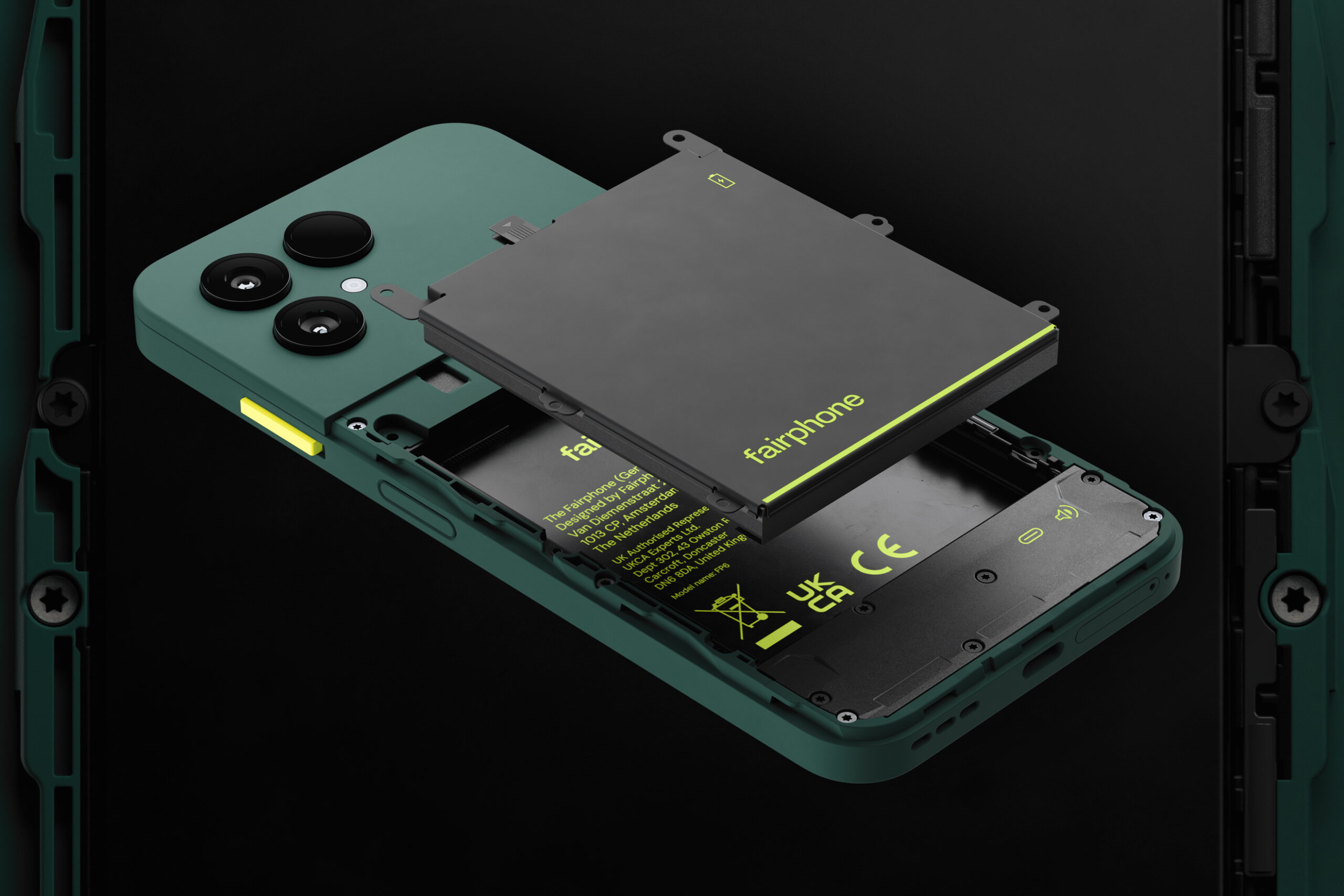 The battery being removed from the Fairphone 6 smartphone while its back panel is removed.