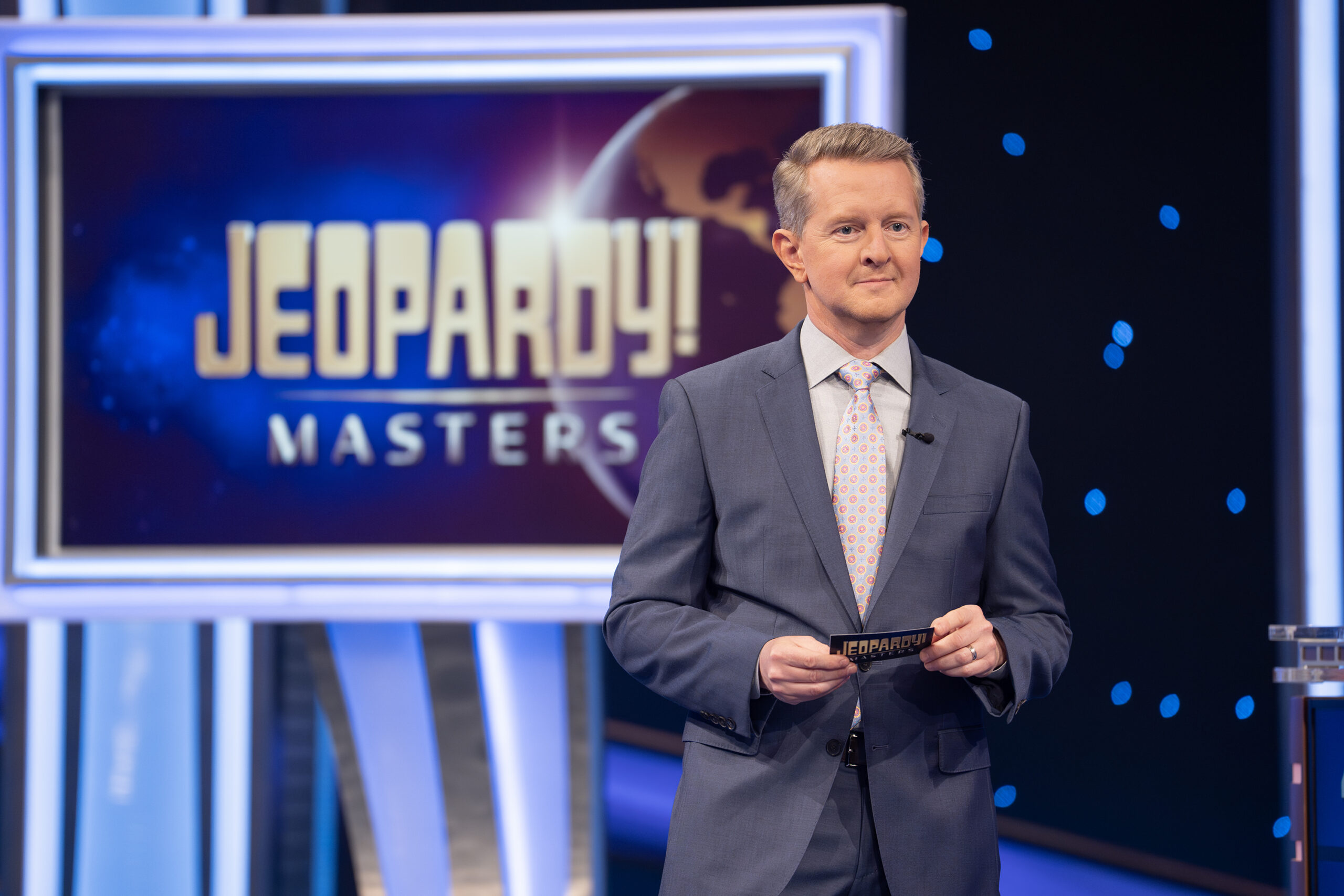 An image showing Ken Jennings hosting Jeopardy!
