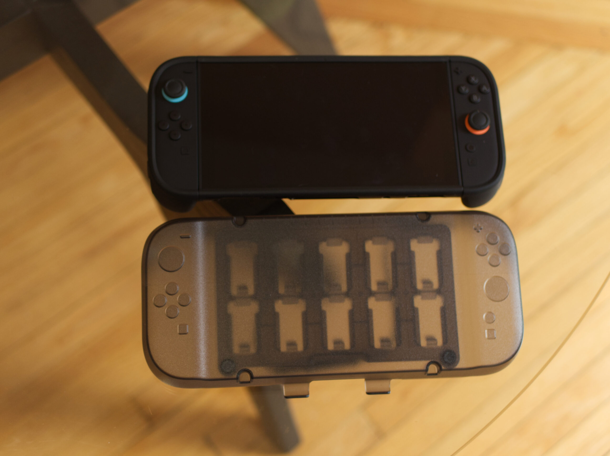 A top-down view of the Switch 2 and Killswitch on a glass table.