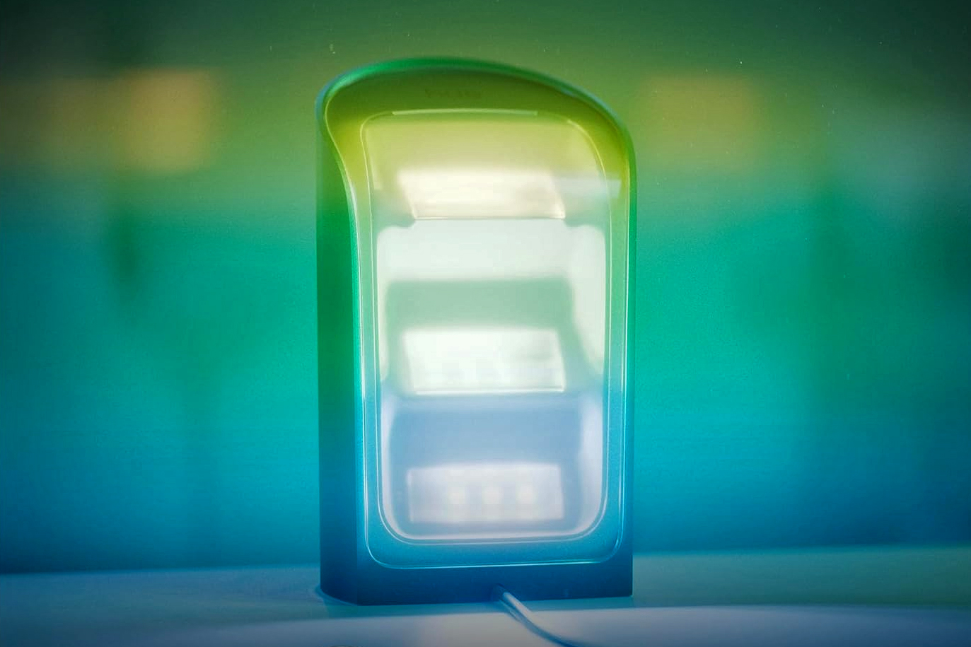 A close-up of the glowing LEDs on the back of Philips new Hue Wall Washer light.