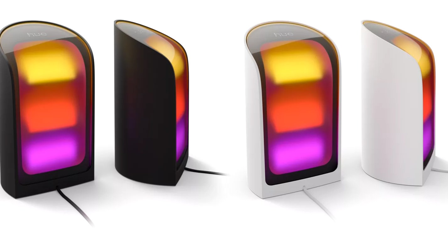 The Philips Hue Play Wall Washer lights in two different colors pictured at different angles.