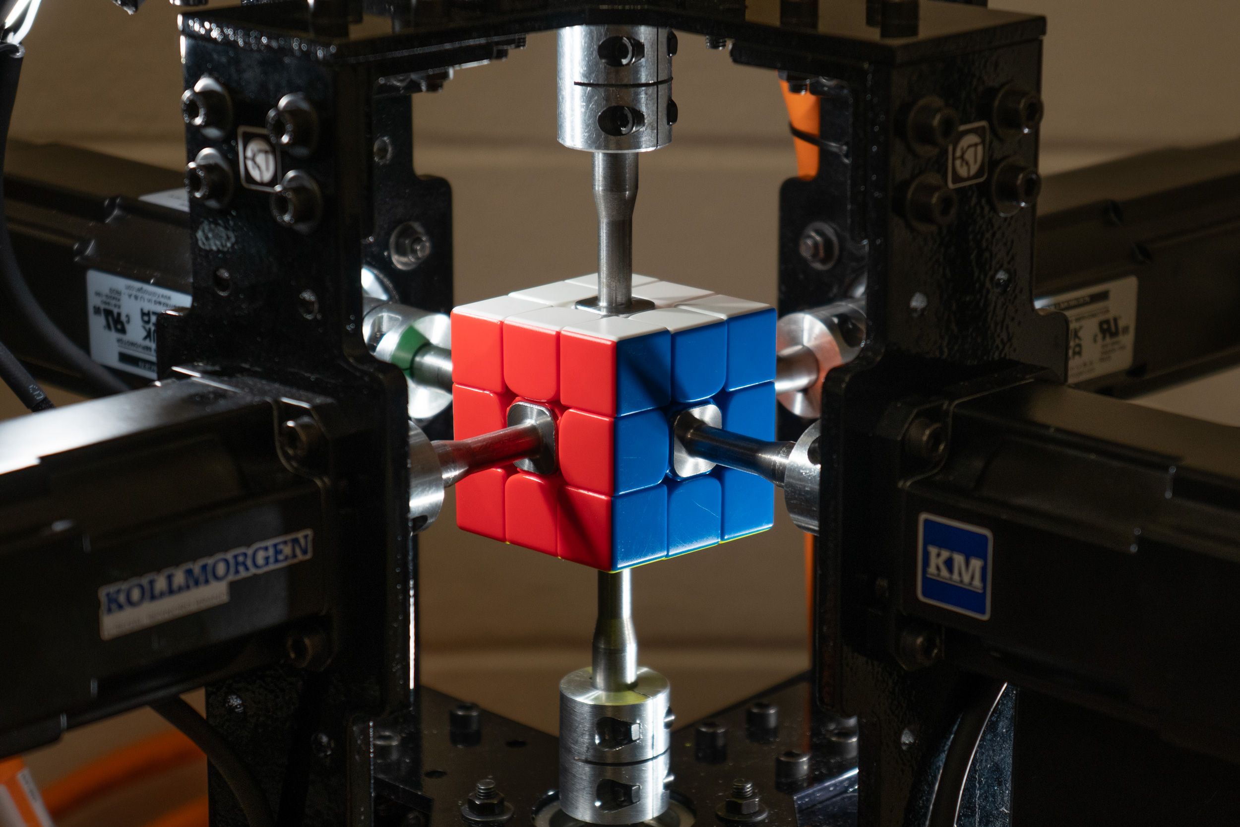 A close-up of a Rubik’s Cube inside the cube-solving robot.