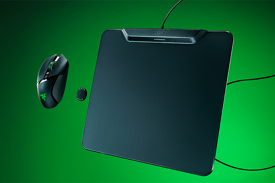 Razer’s HyperFlux V2 Wireless Charging System floating against a green background.
