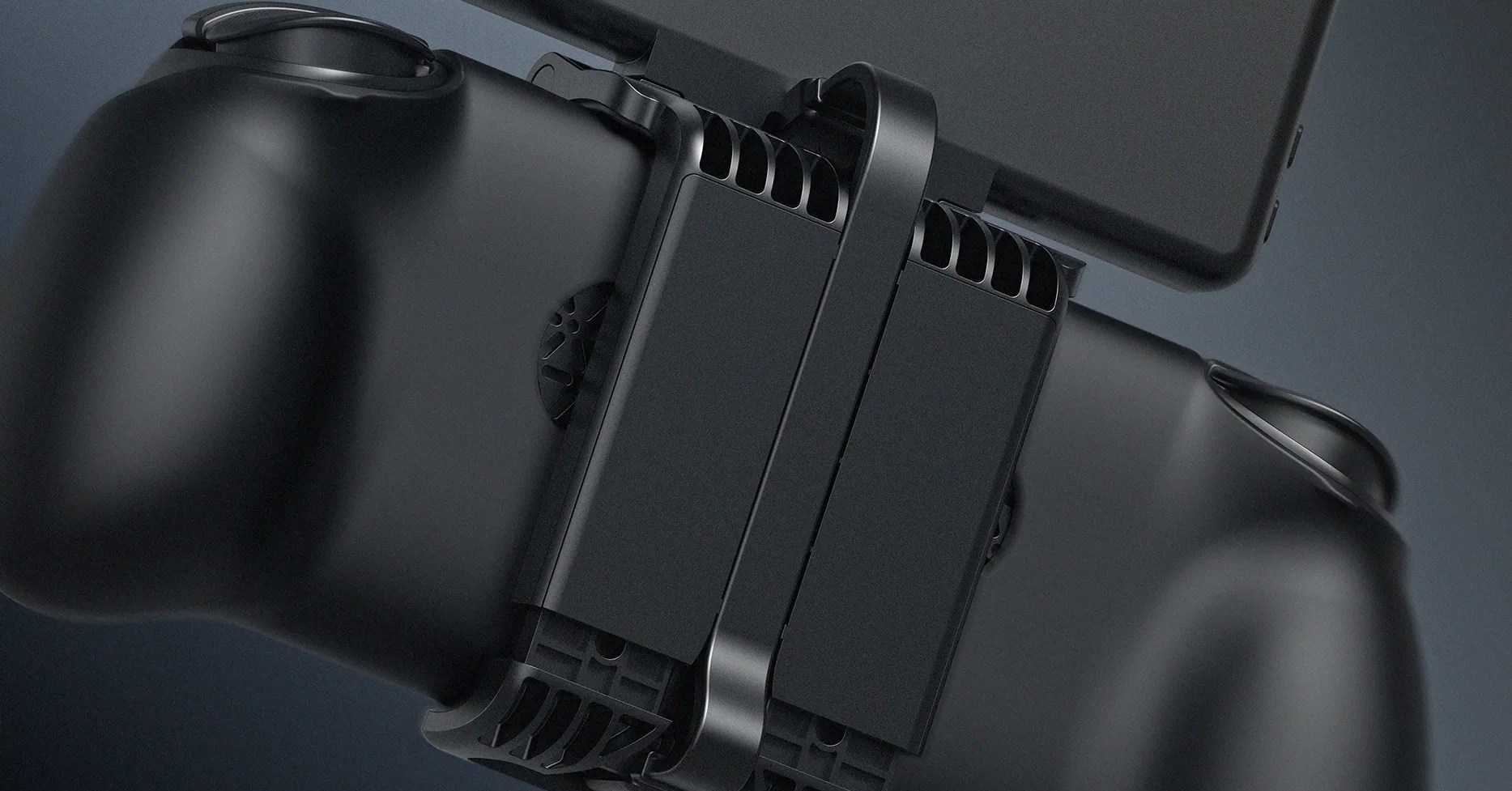 A close-up of the Retroid screen add-ons clamping mechanism attached to the back of a handheld.