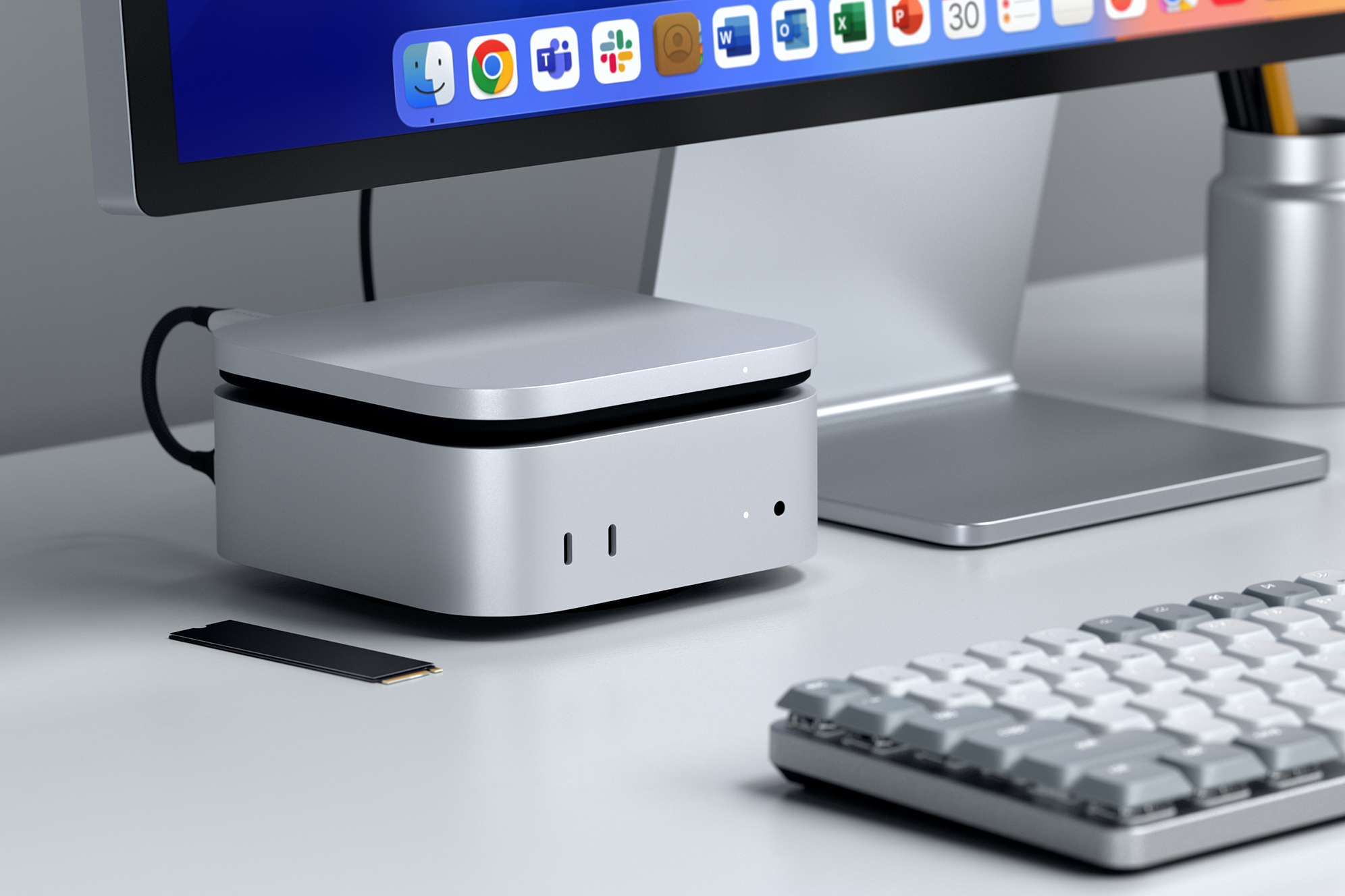 Satechi’s new USB4 SSD enclosure sitting atop an Apple Mac Mini M4.