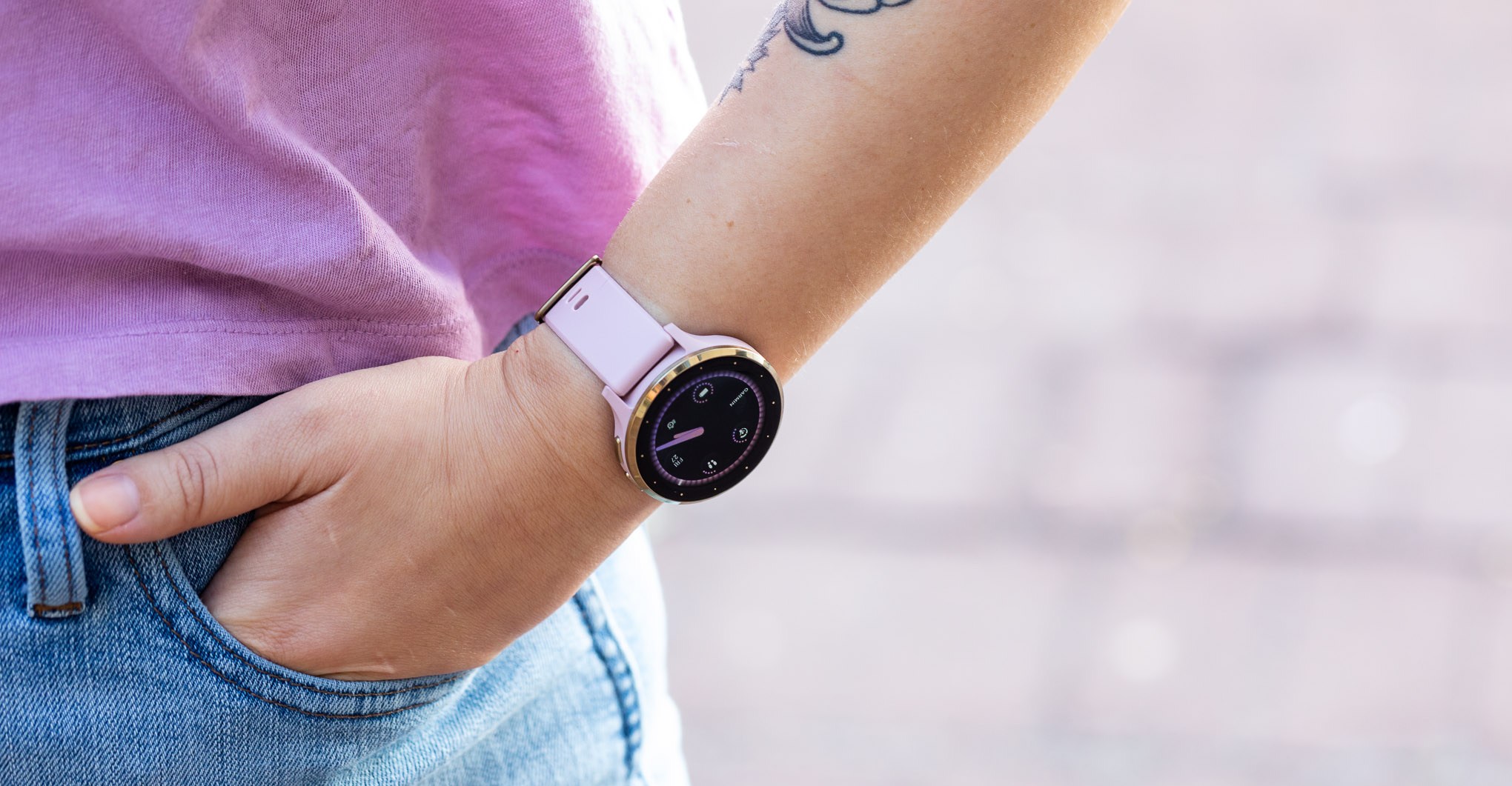 Person wearing the Garmin Venu 3S while putting their hand in a jeans pocket.