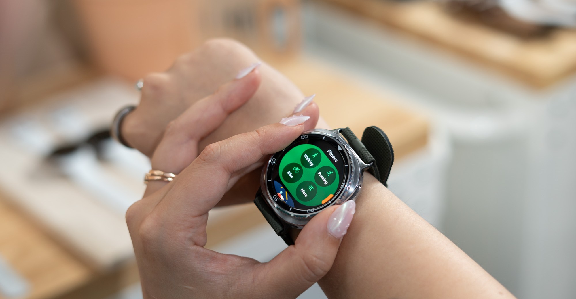Samsung Galaxy Watch showing workout mode selection.