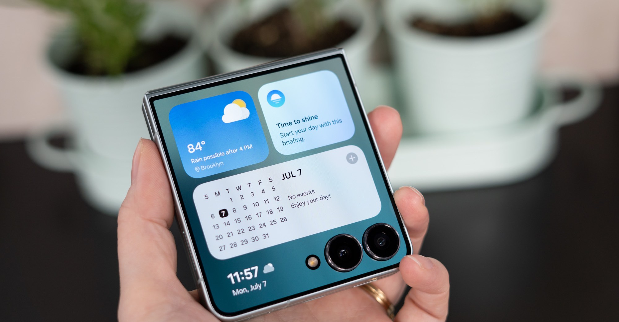 The Galaxy Z Flip 7 in a person’s hand.