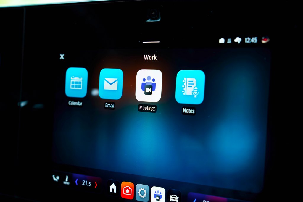 Image of the Microsoft Teams logo on a car infotainment screen.