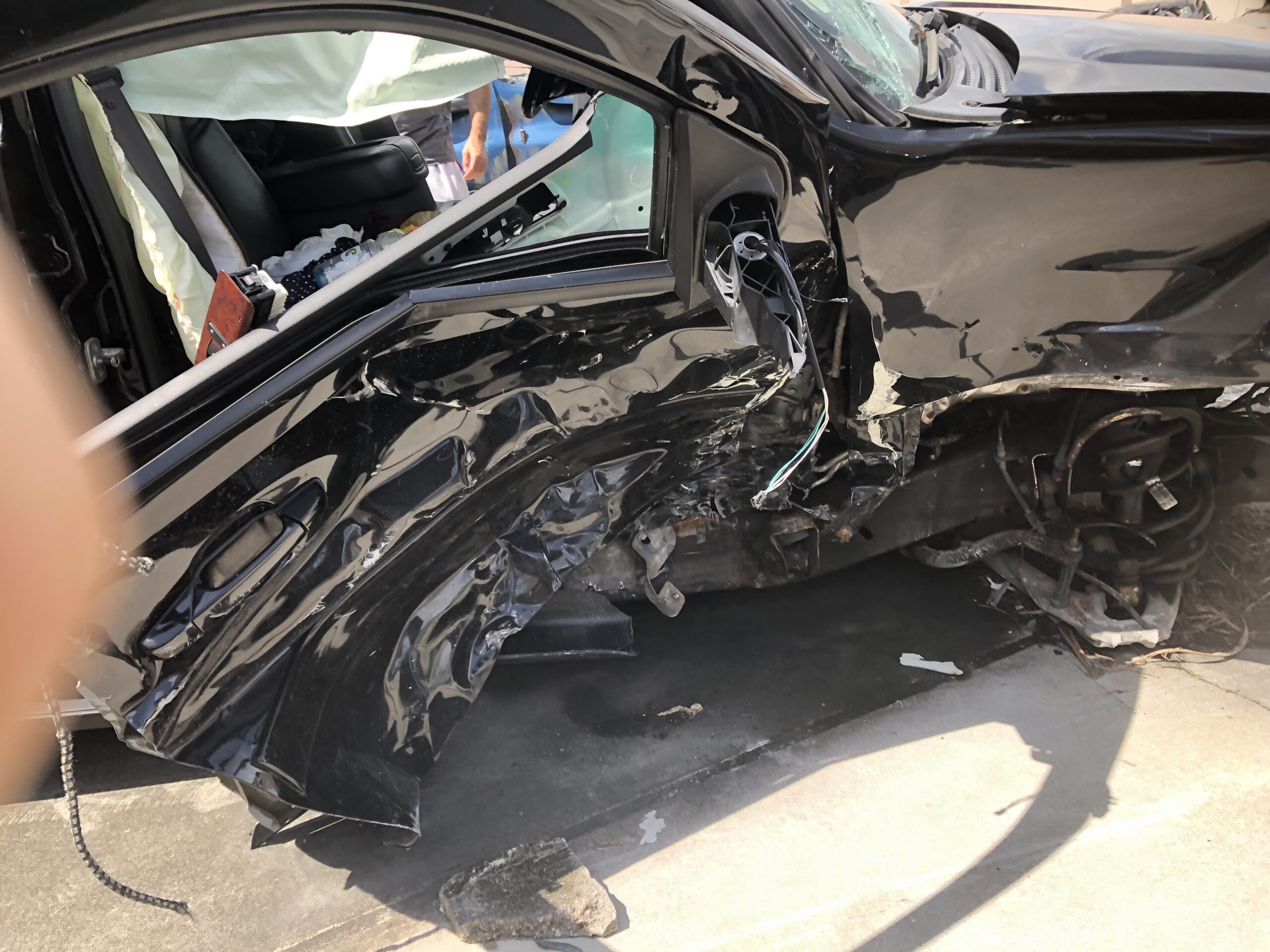 photo of smashed vehicle in Tesla Autopilot lawsuit