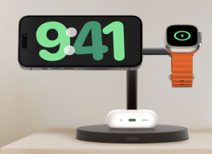 Belkin’s 3-in-1 Qi2 charging station charging a phone, smartwatch, and wireless earbuds.