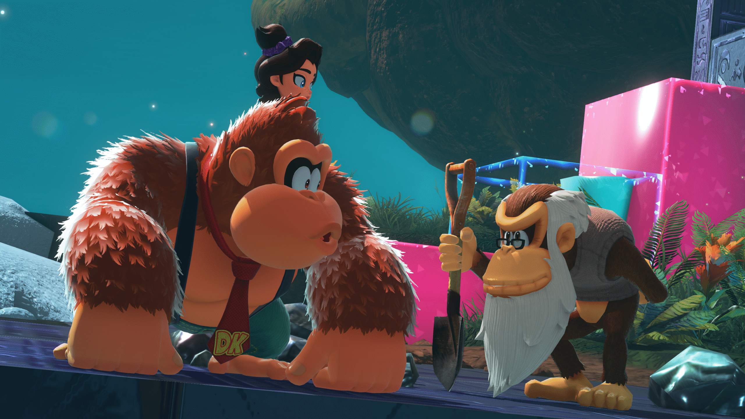A screenshot from Donkey Kong Bananza depicting a large ape wearing suspenders and a tie. The large ape also has a small human girl on his back, and the two are looking to their left at a small, over ape with a big white beard.