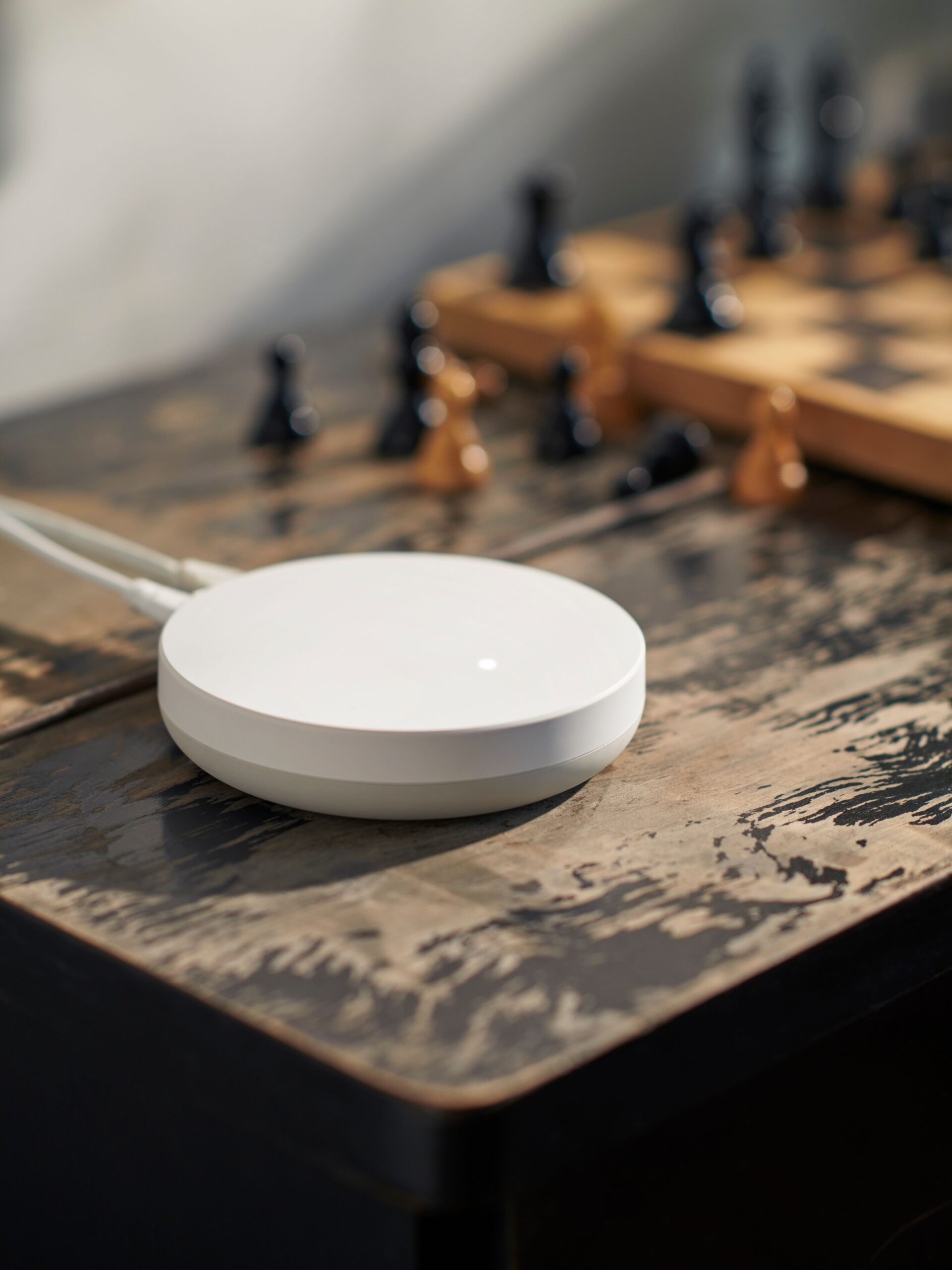 A white hub on a table.
