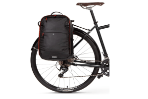 back end of bicycle with backpack attached.