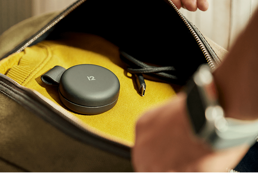 The Twelve South Butterfly SE 2-in-1 Qi2 Charger folded up in a bag.