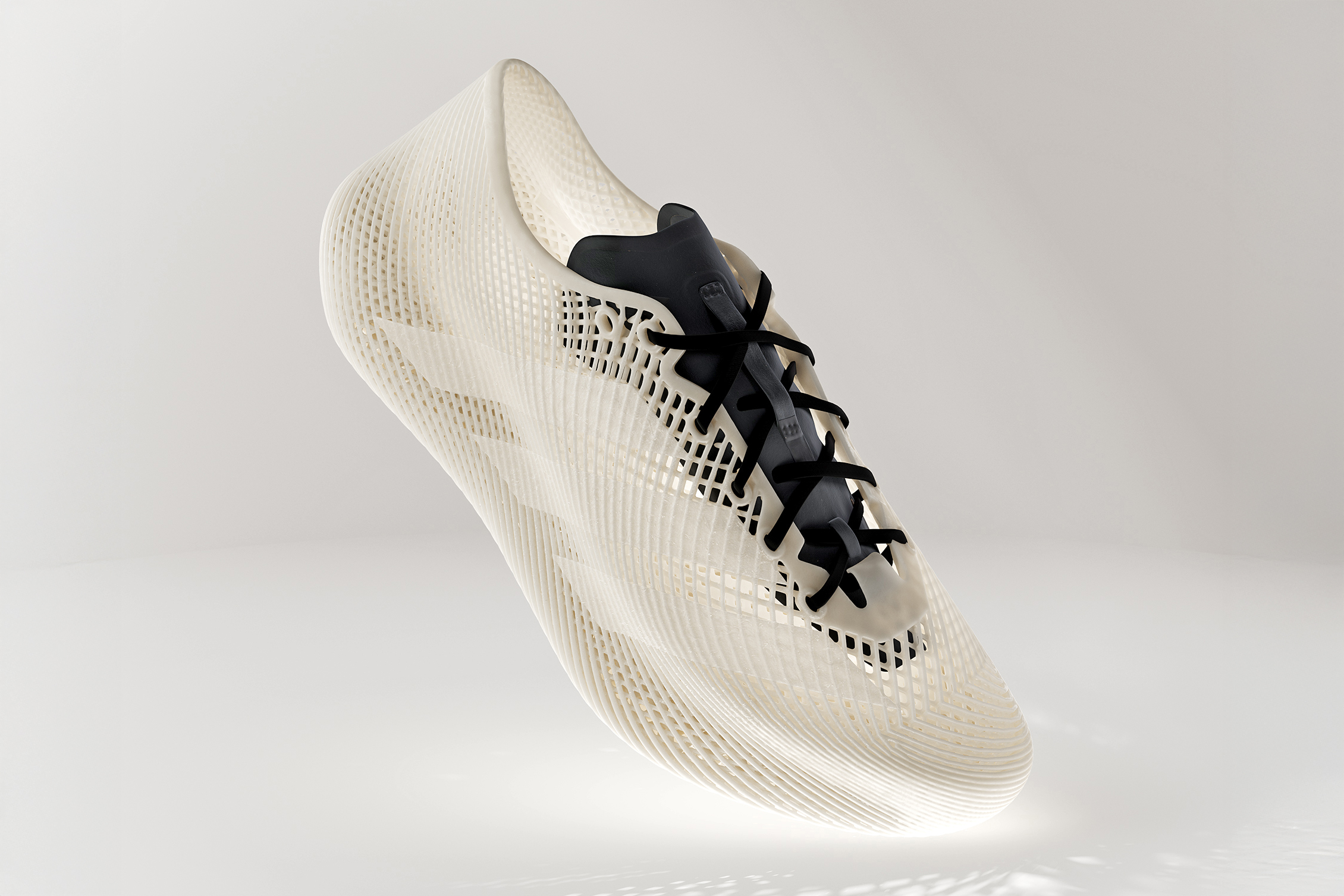 Adidas’ 3D-printed Climacool Laced shoes floating against an off-white background.