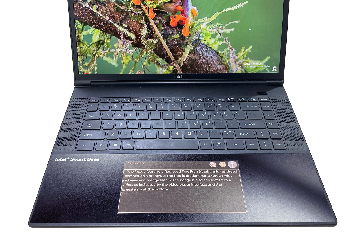 An Intel laptop mockup featuring a touchpad that doubles as an E Ink display.