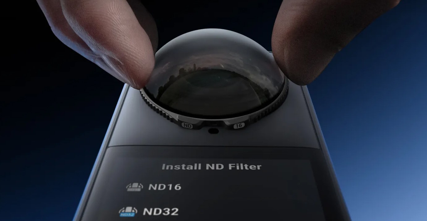 A close-up of an ND filter lens being attached to the Insta360 X5 action camera.