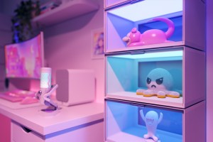A close-up of plush toys and vinyl collectibles inside a stack of Nanoleaf Expo Smart Display Cases.