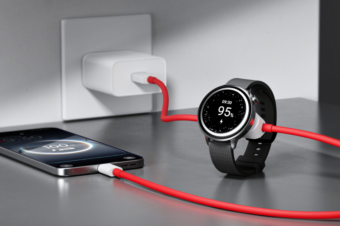 A smartphone and smartwatch connected to a red USB-C cable which is plugged into a power adapter.