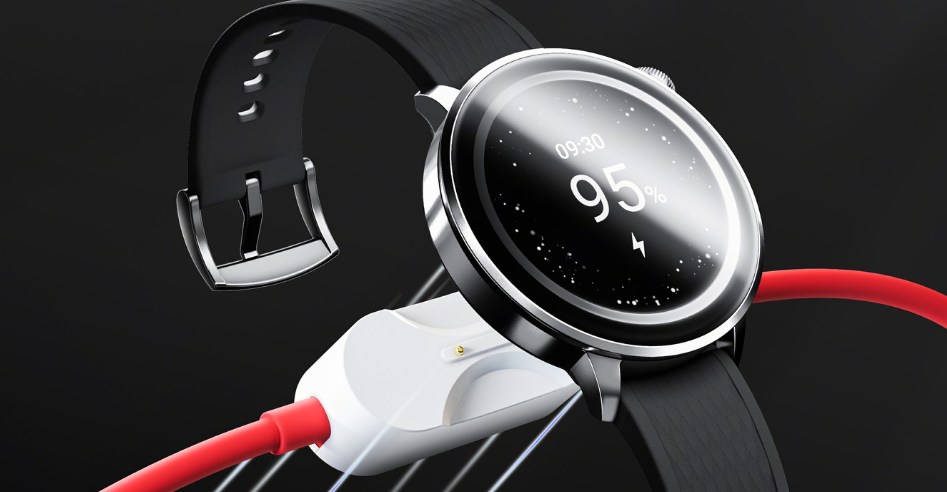 A close-up of a OnePlus smartwatch being lowered onto a charging port.