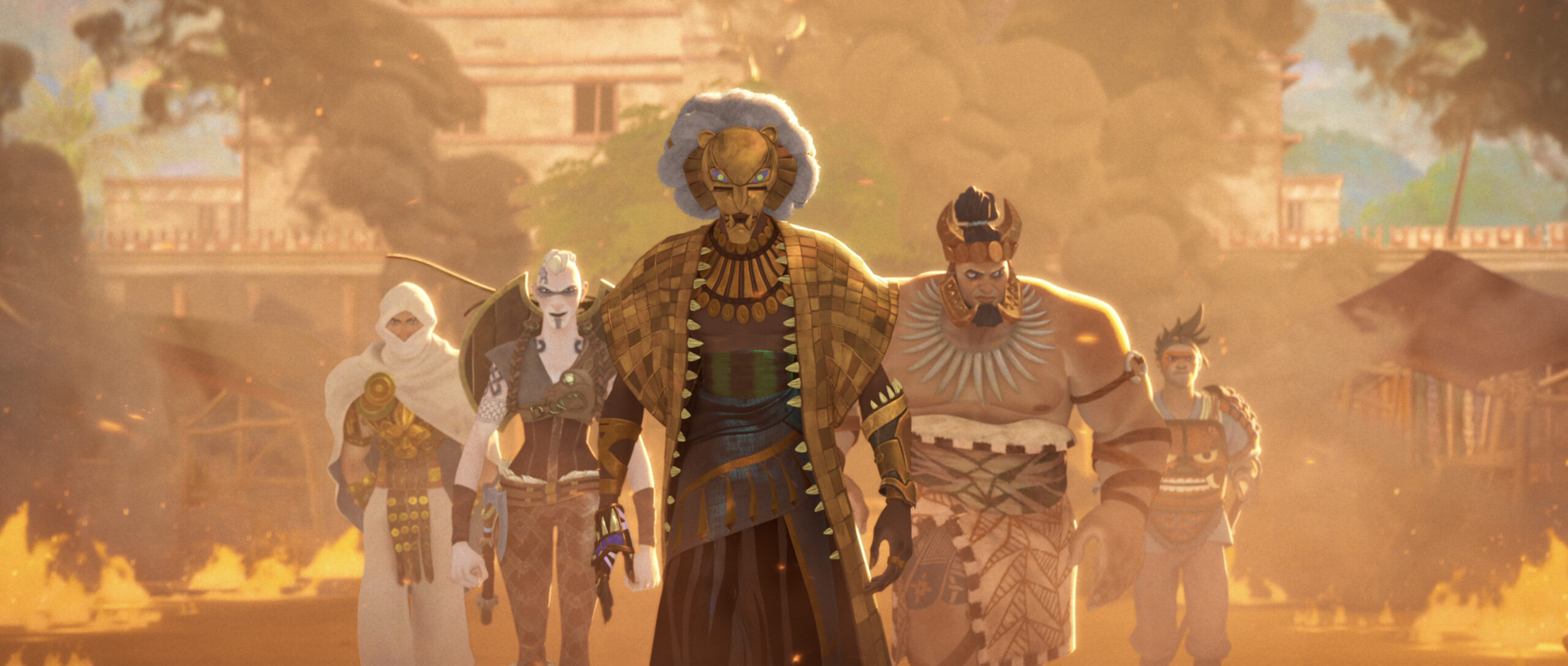 A man wearing a golden lion mask with a white mane, a golden shawl, and intricate leather armor. To the left, the man is blanked by a pale woman viking and a man wearing white robes to his. To the right, the man is flanked by a bare chested man with a flowing garment that comes up to his abdomen and another man wearing a full suit of tribal armor.