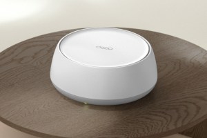 TP-Link's BE Wi-Fi Router on top of a desk.