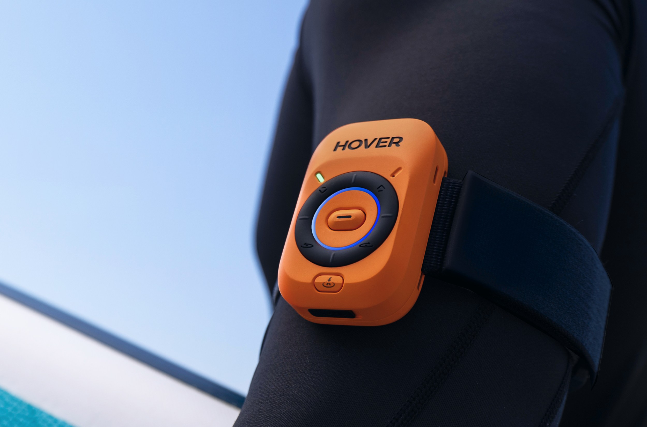 The HoverAir Lighthouse accessory worn on someone’s arm.