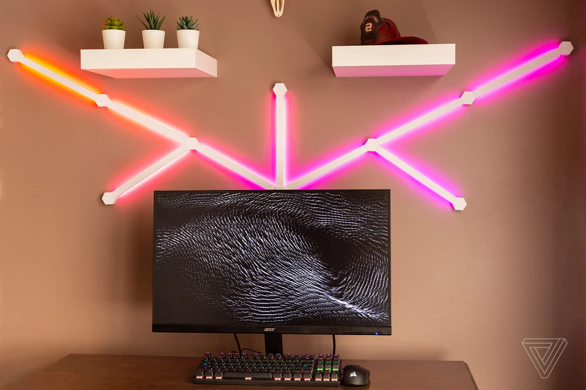 Nanoleaf’s Lines on a wall behind a monitor.