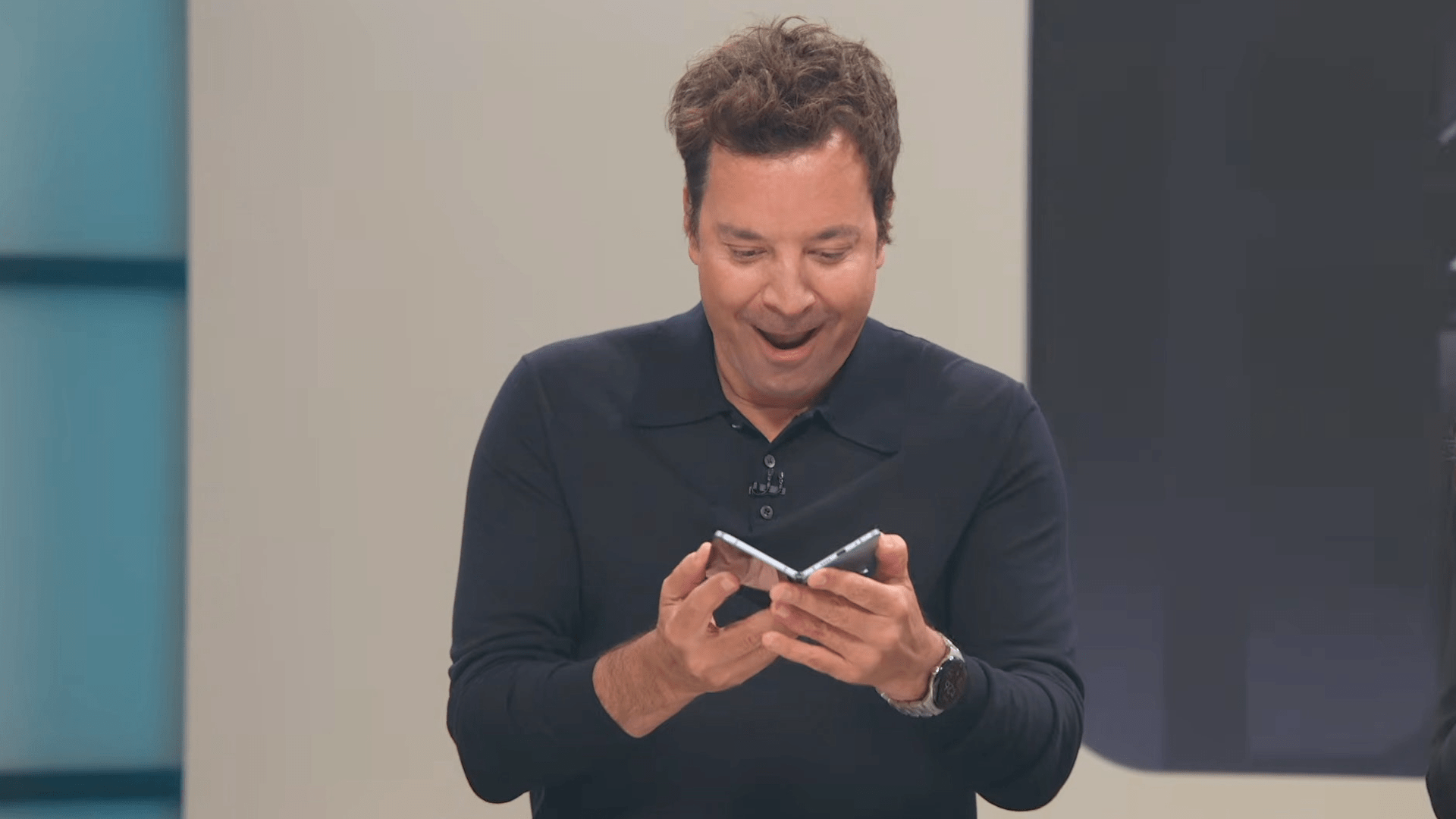 Close up of Jimmy Fallon ogling a Pixel 10 Fold. 