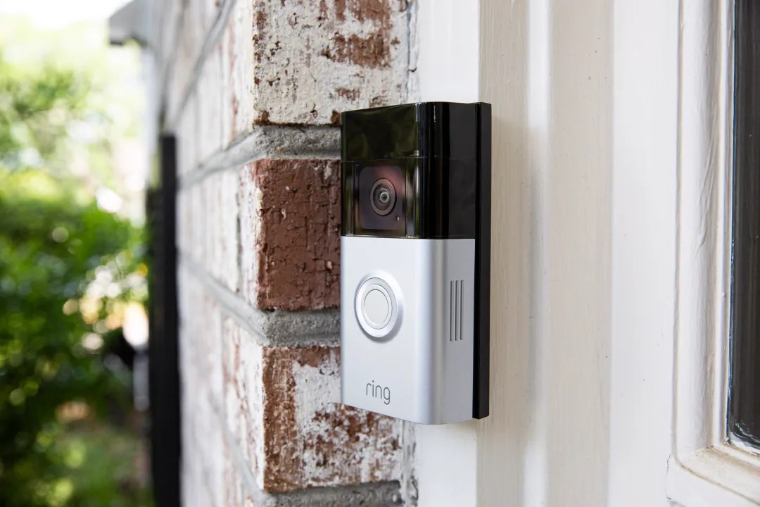 The Ring Battery Doorbell Plus mounted outside of a porch.
