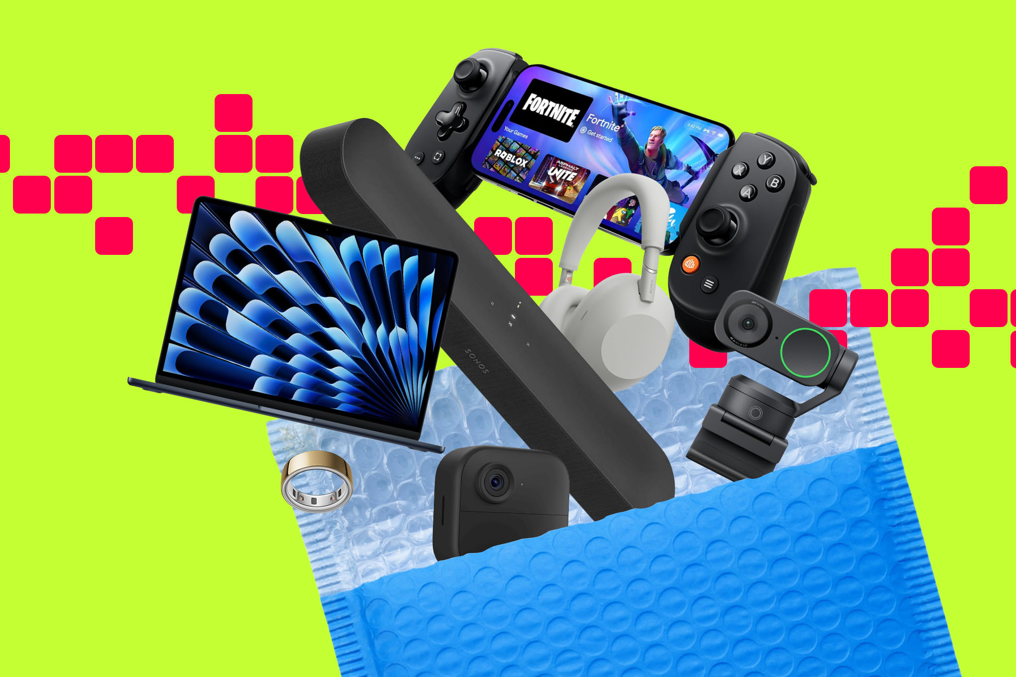 An image showing multiple tech products, including the Backbone Pro, a Sonos Beam soundbar, an Oura ring, and more coming out of a bubble mailer.