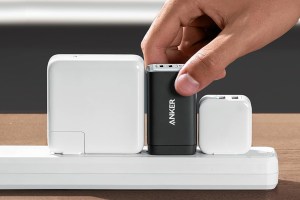 Anker’s Nano II 65W charger sandwiched between two other chargers.