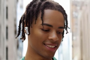 Samsung Galaxy Buds 3 FE being worn.