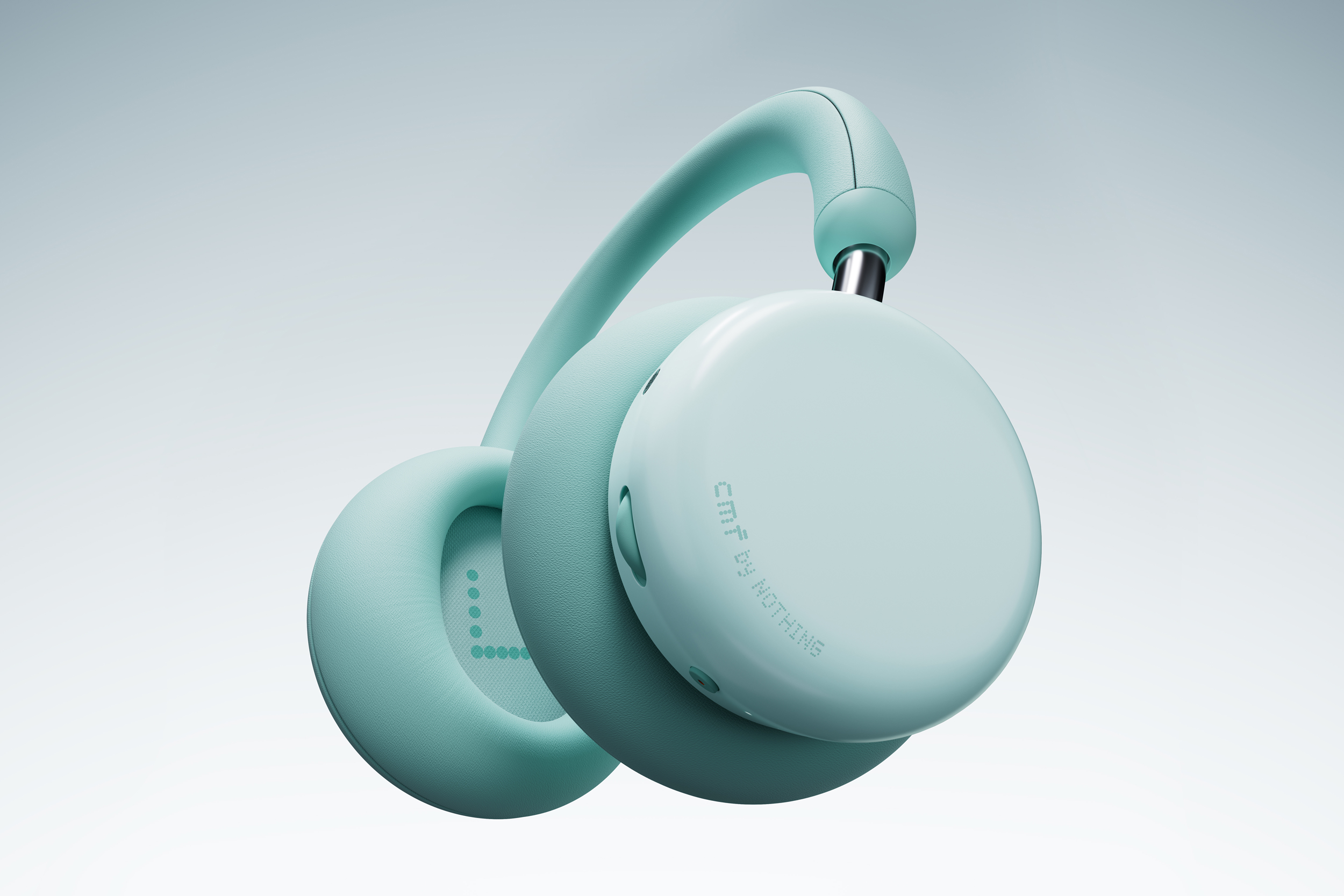 The CMF Headphone Pro pictured in light green against a gradient background.