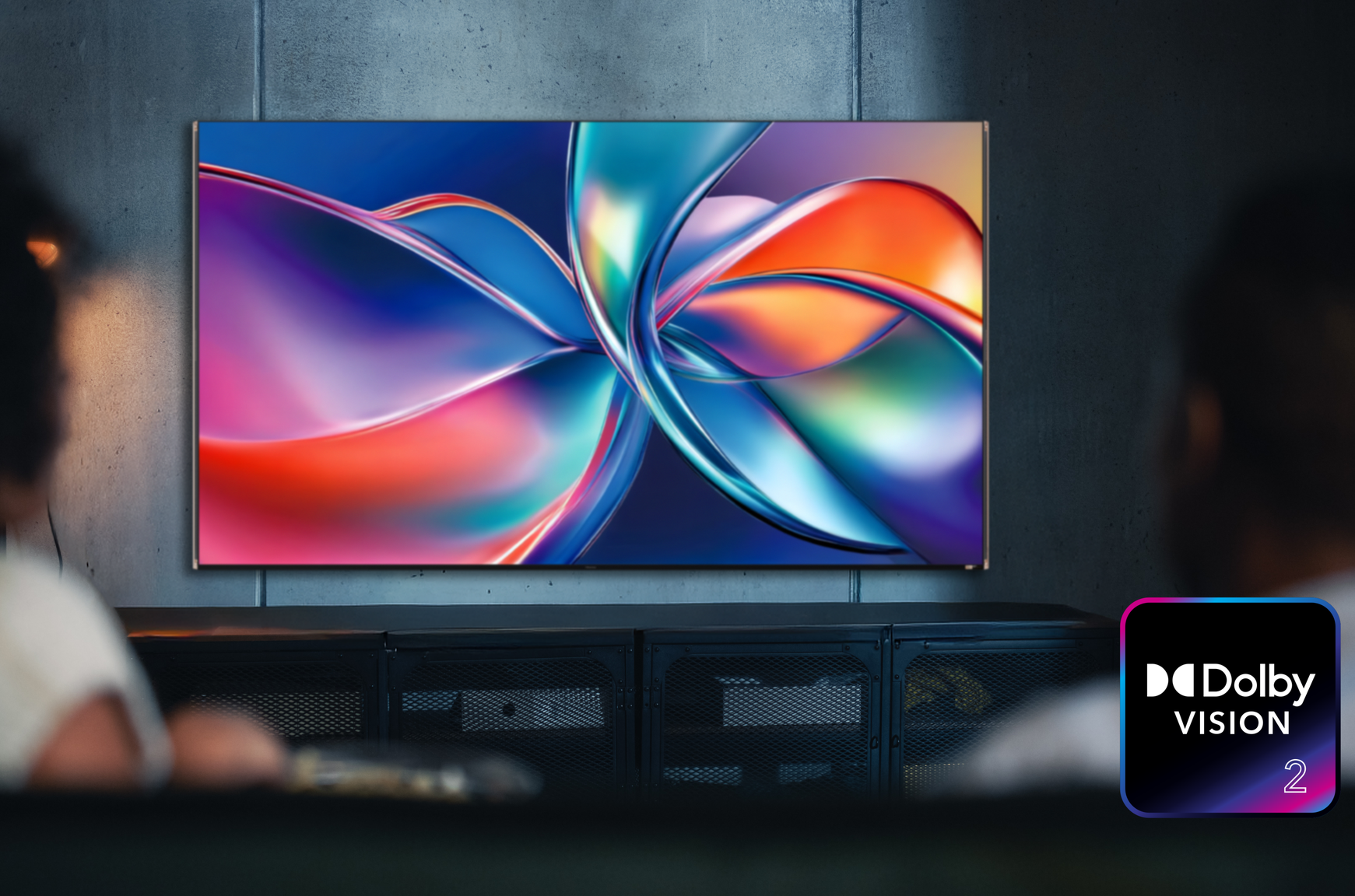 A photo of someone viewing an abstract image on a TV