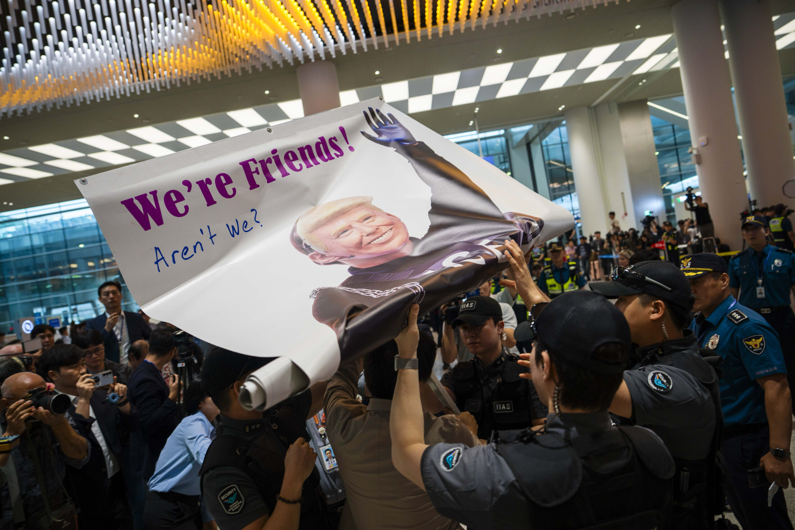 photo of Trump on a poster in South Korea