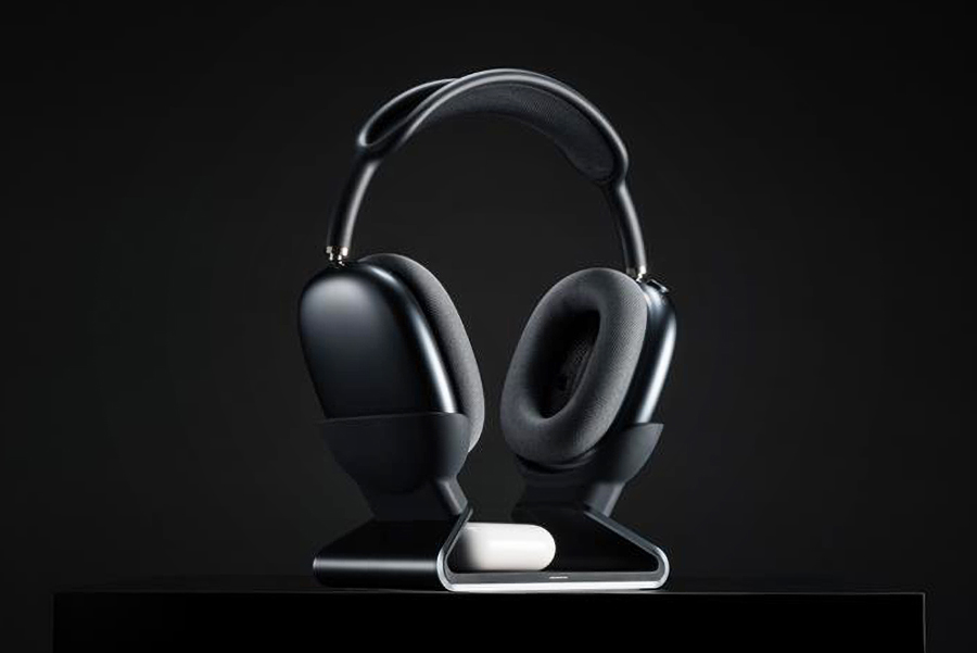 A pair of AirPods Max headphones docked in Mophie’s new charging stand.