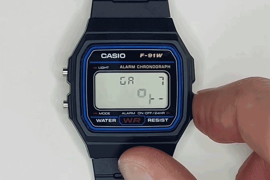 A game called Ping being played on a Casio F-91W digital watch.