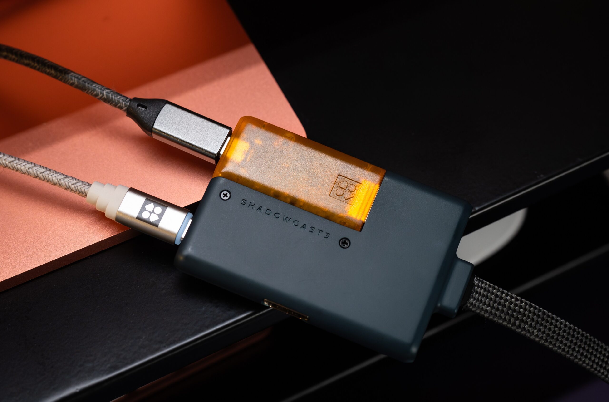 An image showing Genki’s Shadowcast 3 capture card with cables connected. An image showing Genki’s Shadowcast 3 capture card with cables connected.