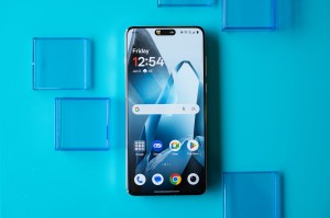 The OnePlus 13 in blue with vegan leather back panel.