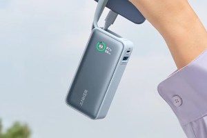 Anker's Nano Power Bank (10K, 2-Ports, Built-in USB-C cable) being held.