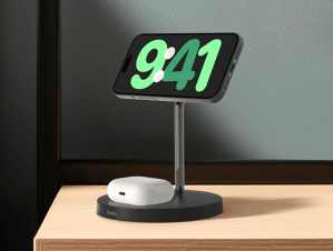 The Belkin MagSafe 2-in-1 wireless charging stand charging an iPhone and AirPods.