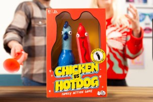 Chicken vs. Hotdog game box with players behind it.