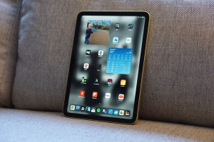 An 11th-generation iPad on a couch.